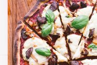 Flavorful Gluten-Free Vegan Pizza with Earthy Mushrooms and Sweet Onions