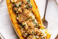 Creamy Vegan Spinach and White Bean Delicata Squash Boats