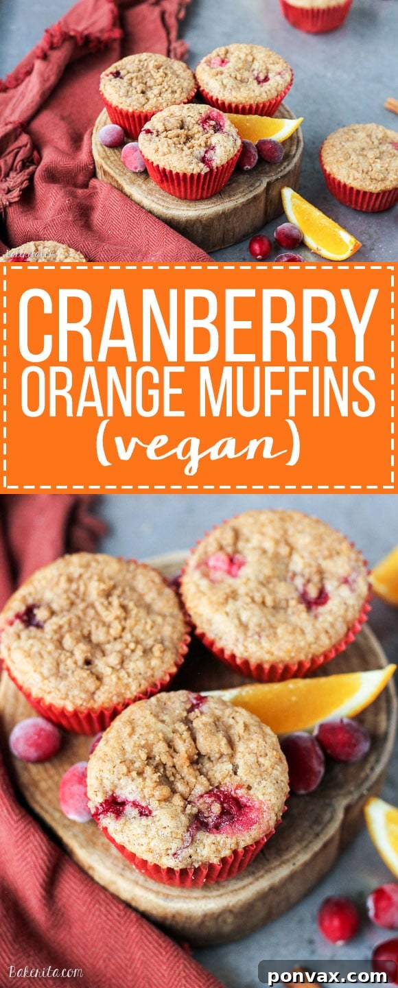 Beautifully baked Vegan Cranberry Orange Muffins cooling on a wire rack.