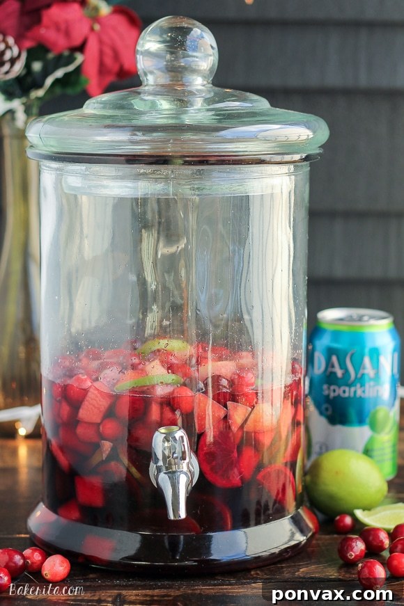 Tangy Cranberry Lime Sangria 3 Fresh cranberries, sliced limes, and diced apples infusing in red wine for a festive Cranberry Lime Sangria.