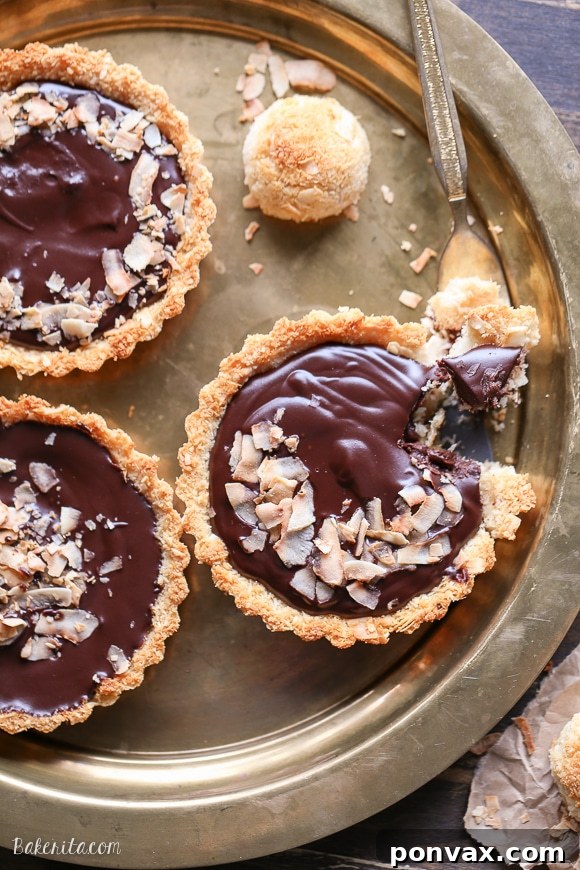 Chocolate Coconut Ganache Dream Tarts 4 Array of mini Chocolate Ganache Tarts with Coconut Macaroon Crust, ideal for Paleo and gluten-free diets
