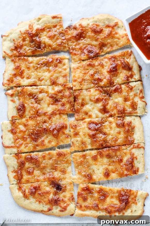 Whimsical Wands 2 Delicious Sweet Sticks with melted mozzarella, garlic, and brown sugar, a perfect salty-sweet breadstick snack.