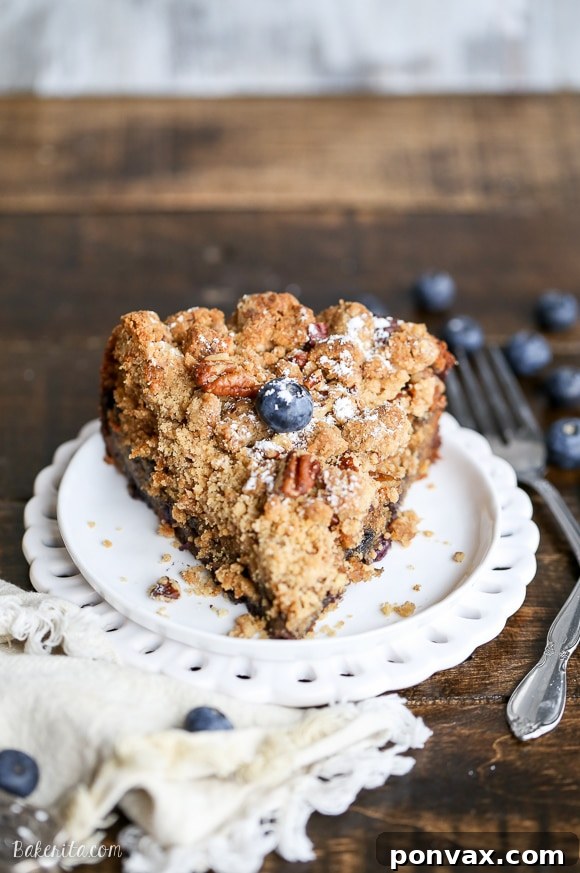 A close-up of the Blueberry Crumb Cake, showcasing the juicy blueberries and crumbly topping.