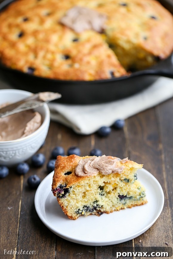 Blueberry Burst Skillet Cornbread 5 This Blueberry Cornbread is a sweeter take on traditional cornbread with fresh blueberries and sweet corn kernels. It's baked in a skillet and served with whipped cinnamon honey butter.