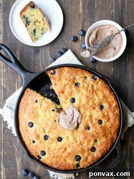 Blueberry Burst Skillet Cornbread 7 This Blueberry Cornbread is a sweeter take on traditional cornbread with fresh blueberries and sweet corn kernels. It's baked in a skillet and served with whipped cinnamon honey butter.