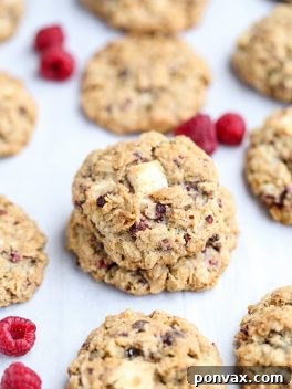 These Raspberry White Chocolate Oatmeal Cookies are super thick with crisp edges, big chunks of white chocolate and freeze dried raspberries.