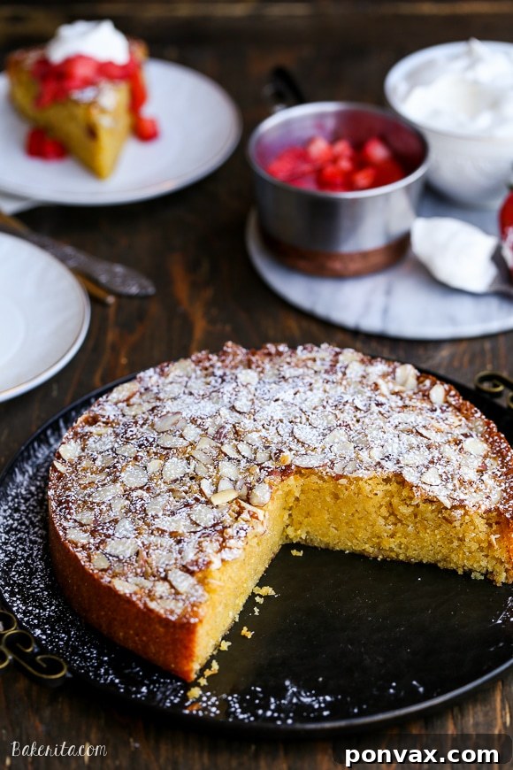 This Gluten Free Honey Cornmeal Cake with Strawberry Compote + Honey Whipped Cream is a quick and easy cake that's incredibly delicious and perfect for either dessert or brunch!