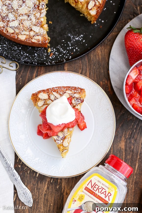 This Gluten Free Honey Cornmeal Cake with Strawberry Compote + Honey Whipped Cream is a quick and easy cake that's incredibly delicious and perfect for either dessert or brunch!
