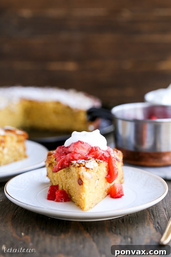 This Gluten Free Honey Cornmeal Cake with Strawberry Compote + Honey Whipped Cream is a gorgeous dish that's perfect for dessert or brunch!
