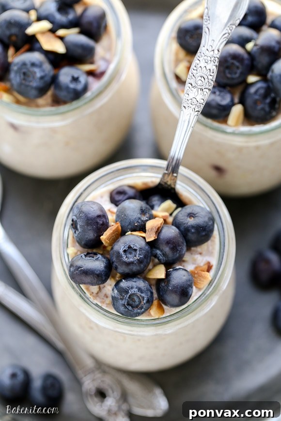 Blueberry Muffin Overnight Delight 3 Close-up of Blueberry Muffin Overnight Oats, showcasing plump blueberries and creamy texture.