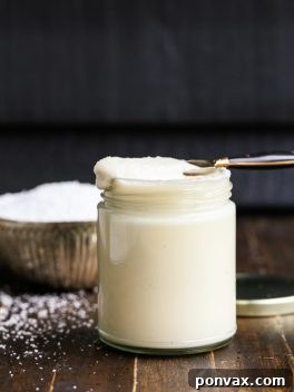 Homemade Coconut Butter has just one ingredient: coconut! It's easy to make at home in a food processor or high-powered blender and can be used in TONS of ways - it's great as a spread on it's own and can also be used in many different recipes.