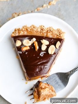 Vegan Chocolate Peanut Butter Tart with Pretzel Crust, a perfect gluten-free and vegan dessert.