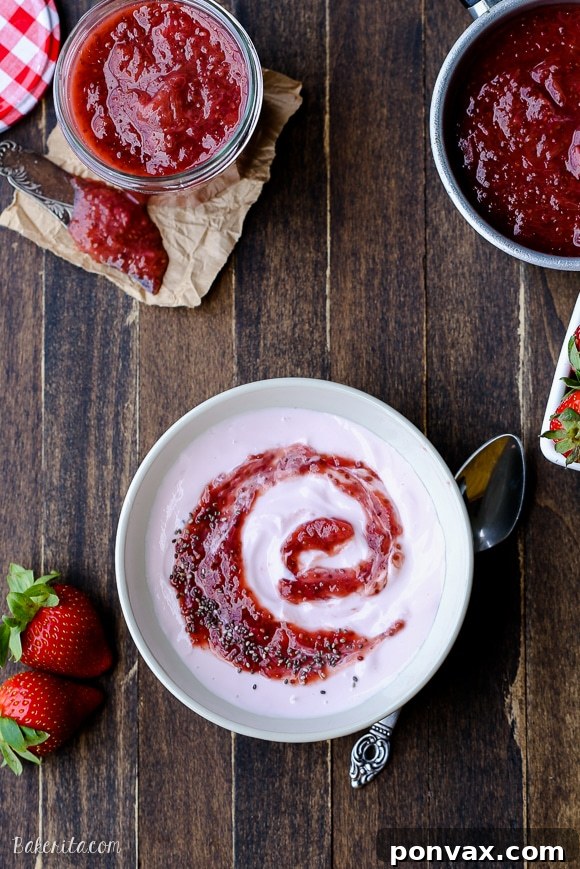 Vibrant Strawberry Rhubarb Chia Jam 3 Close-up of a jar of fresh Strawberry Rhubarb Chia Jam, showcasing its delightful texture and natural ingredients, ideal for a refined sugar-free diet.