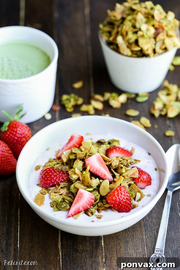 Zen Matcha Granola 4 A bowl of yogurt topped with crunchy Matcha Granola, showcasing its versatility as a healthy breakfast or snack.