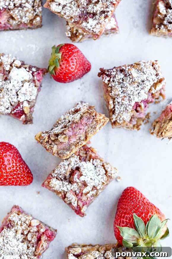 Enjoy the vibrant flavors of fresh, seasonal strawberries in these easy-to-make, gluten-free, and vegan oatmeal crumble bars.