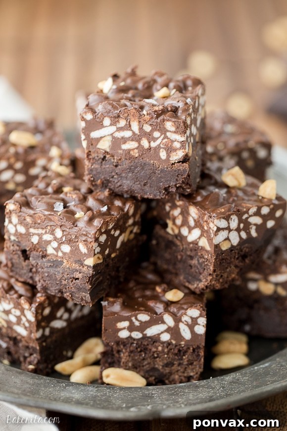 These Peanut Butter Crunch Brownies are incredibly rich and delicious, with a crunchy and fudgy topping. These gluten-free brownies were made for chocolate and peanut butter lovers!