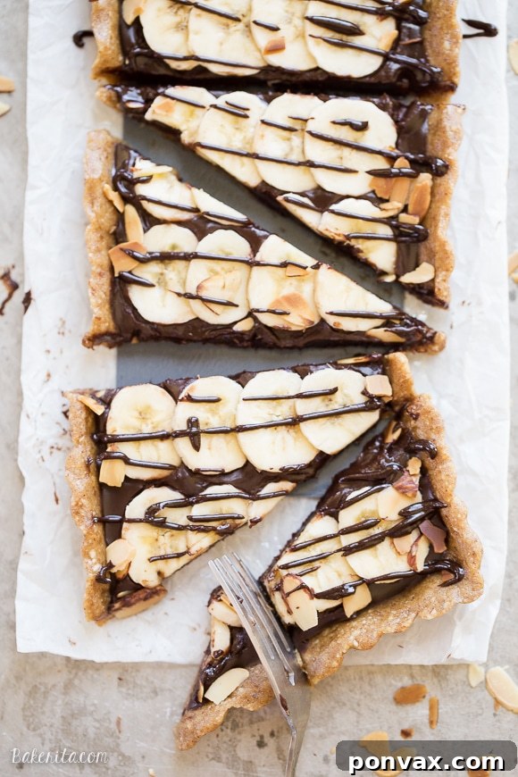 This No-Bake Chocolate Banana Tart has an easy date crust, filled with creamy chocolate ganache and sliced bananas! This quick and simple recipe is only has five ingredients and it's gluten-free, Paleo and vegan.