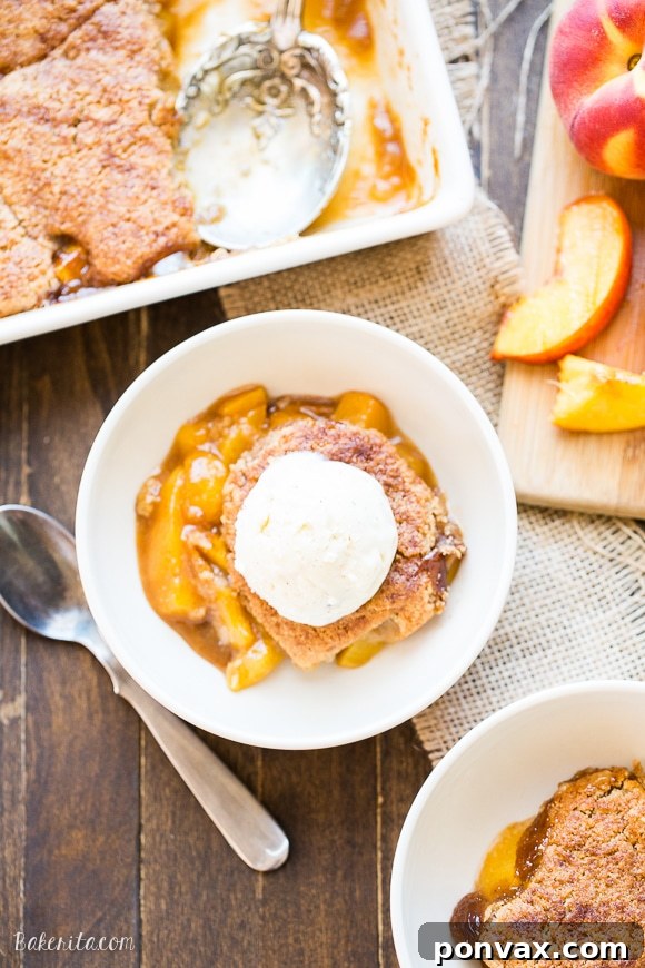 This Peach Cobbler has a crispy, fluffy topping with a simple peach filling - it's the most perfect summer dessert! This is a gluten-free, Paleo, and vegan treat that you don't want to miss.