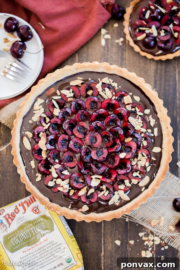 Clean Eating Chocolate Cherry Tart with Almond Crust 5 This Chocolate Cherry Tart has a toasted almond shortbread crust filled with silky chocolate ganache and fresh cherries! This gluten-free, Paleo, and vegan dessert is incredibly rich and comes together quickly.