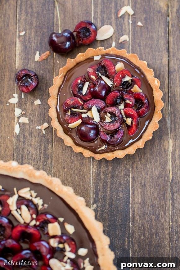 Clean Eating Chocolate Cherry Tart with Almond Crust 6 This Chocolate Cherry Tart has a toasted almond shortbread crust filled with silky chocolate ganache and fresh cherries! This gluten-free, Paleo, and vegan dessert is incredibly rich and comes together quickly.