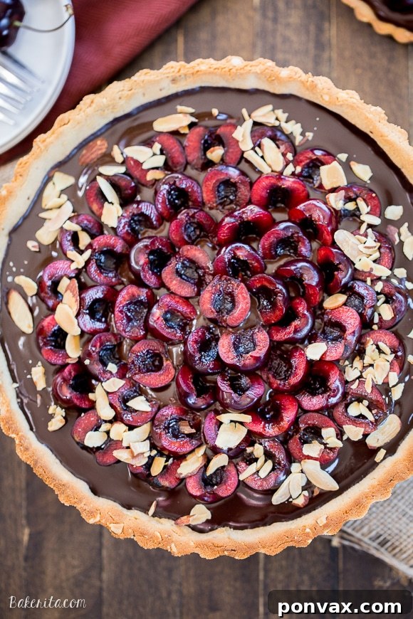 Clean Eating Chocolate Cherry Tart with Almond Crust 7 This Chocolate Cherry Tart has a toasted almond shortbread crust filled with silky chocolate ganache and fresh cherries! This gluten-free, Paleo, and vegan dessert is incredibly rich and comes together quickly.