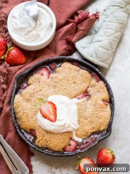 Allergy-Friendly Strawberry Cobbler Dream 7 A small batch gluten-free and vegan strawberry cobbler, perfect for sharing, topped with whipped coconut cream.