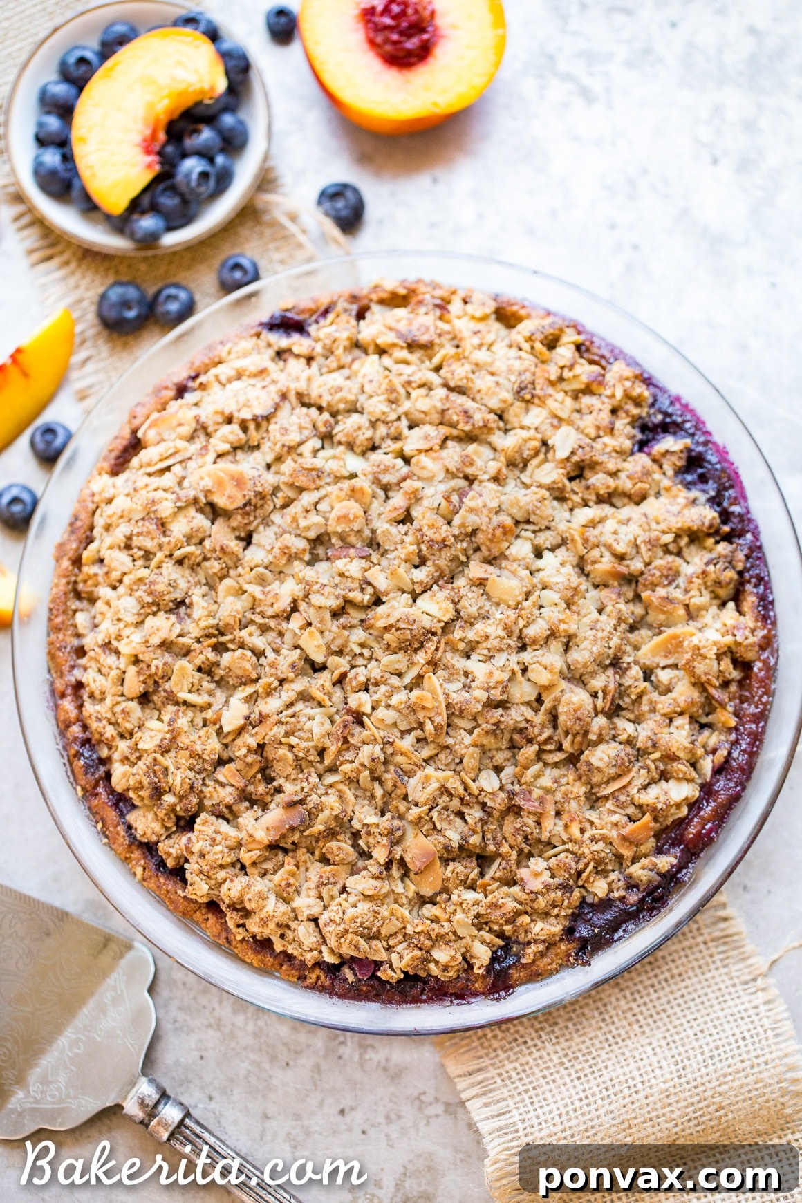 Sweet Freedom Blueberry Nectarine Almond Crumble Pie 2 A beautifully baked Blueberry Nectarine Pie with an oatmeal almond crumble, ready to be served on a summer day.