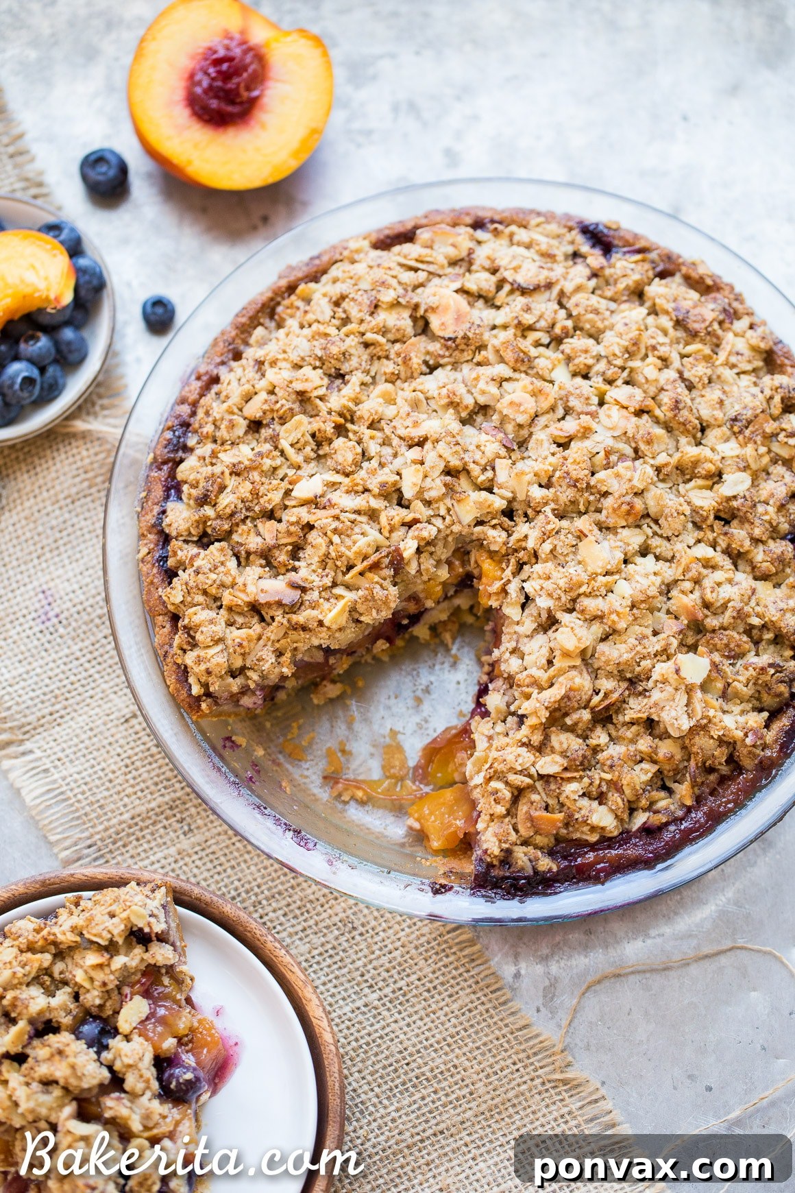 Sweet Freedom Blueberry Nectarine Almond Crumble Pie 3 Close-up shot of fresh, ripe nectarines, highlighting their juicy texture and vibrant color, perfect for baking.