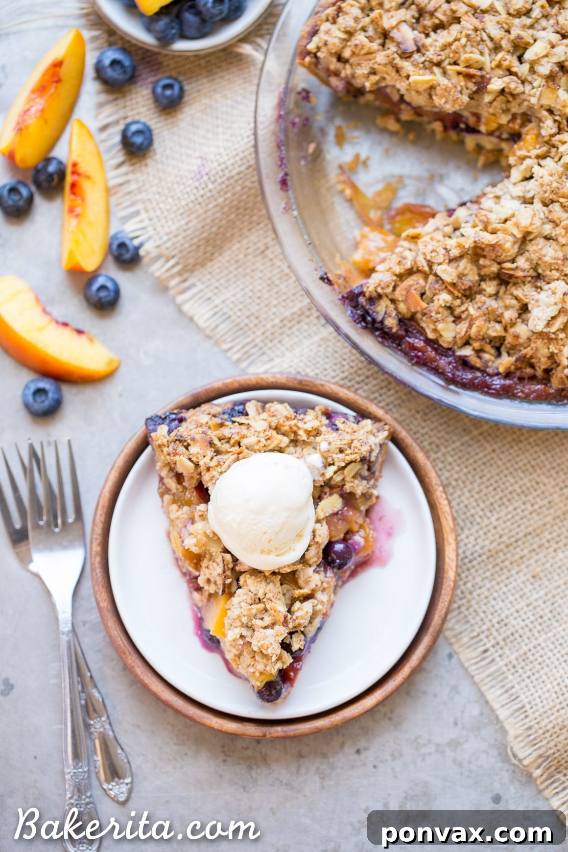 Sweet Freedom Blueberry Nectarine Almond Crumble Pie 4 A delicious Blueberry Nectarine Pie filling, showcasing sliced nectarines and plump blueberries, tossed with spices before baking.
