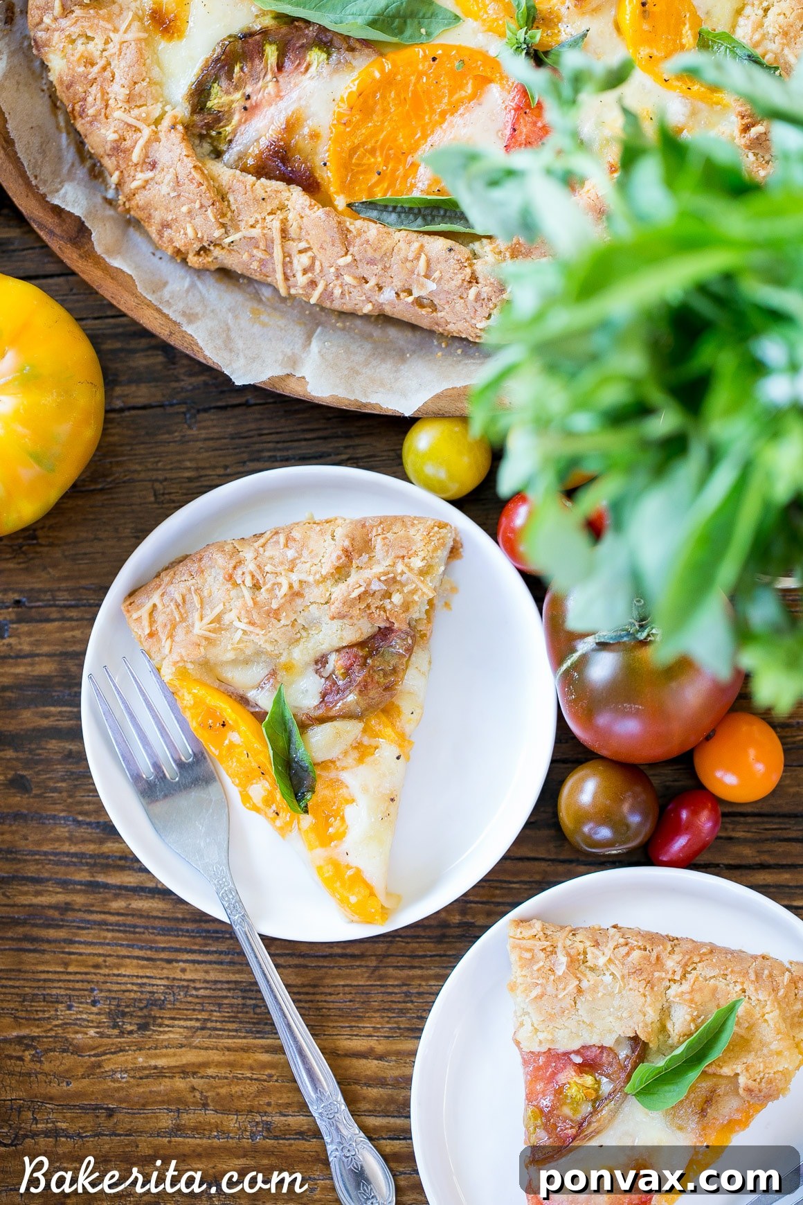 Rustic Gluten-Free Tomato Mozzarella Galette with a Golden Parmesan Crust 4 A slice of Mozzarella Heirloom Tomato Galette on a serving plate, highlighting the layers of tomato, mozzarella, and the robust Parmesan crust.