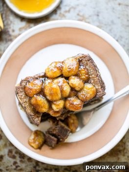 Decadent Caramelized Banana Bread French Toast Gluten Free Paleo Dairy Free 2 This Banana Bread French Toast is topped with caramelized bananas for a banana lover's delight! This gluten-free, Paleo, and dairy-free french toast is sure to satisfy your breakfast and brunch cravings.