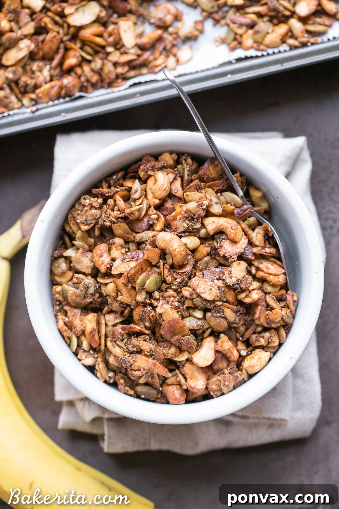Wholesome Banana Almond Grain Free Granola 2 This Banana Almond Butter Grain Free Granola is a crunchy + filling snack, made without any grains or refined sugars! It makes the perfect yogurt or smoothie bowl topping, or just grab a handful to hold you over until your next meal.