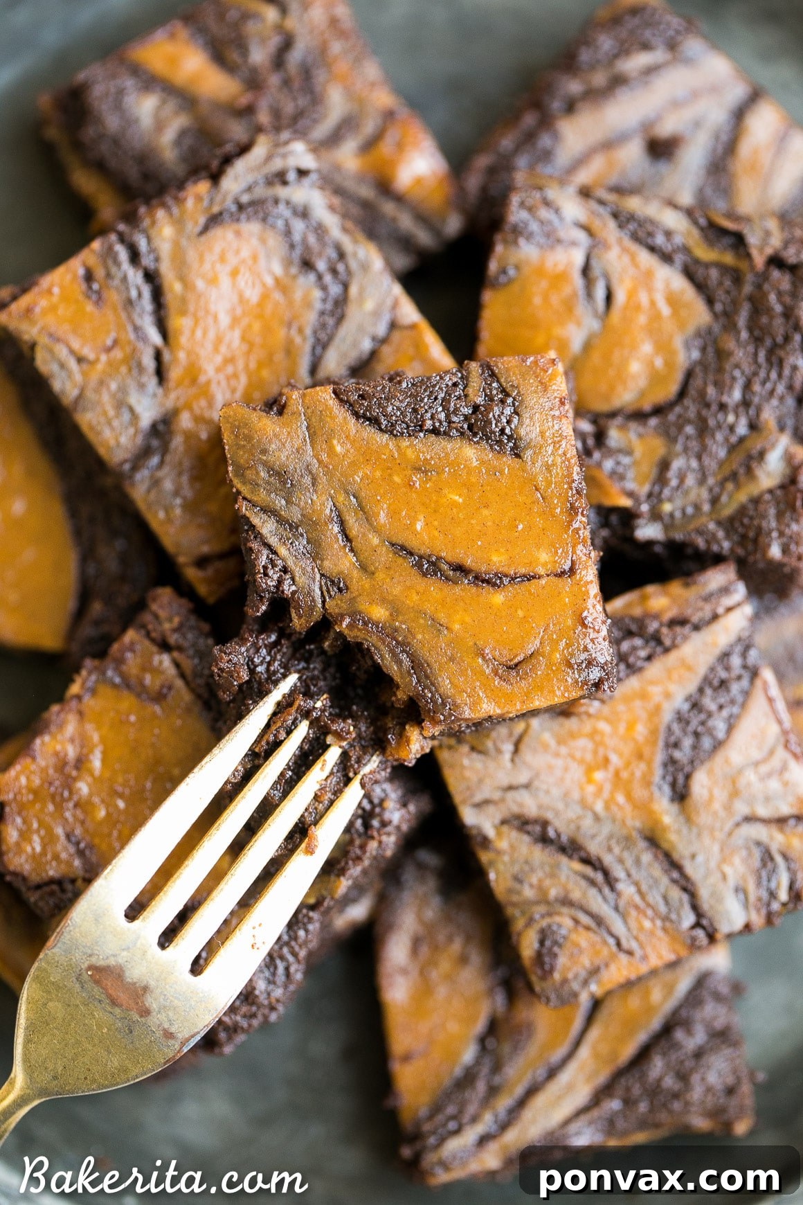 Decadent Gluten-Free Pumpkin Cheesecake Brownies 7 These Pumpkin Cheesecake Brownies are moist + fudgy brownies with a swirled layer of spiced pumpkin cheesecake! These brownies are gluten-free and refined sugar free.