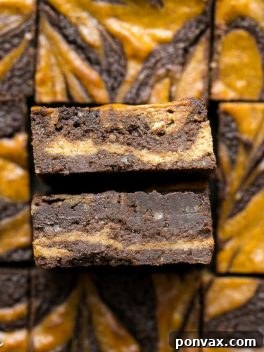 Decadent Gluten-Free Pumpkin Cheesecake Brownies 8 These Pumpkin Cheesecake Brownies are moist + fudgy brownies with a swirled layer of spiced pumpkin cheesecake! These brownies are gluten-free and refined sugar free.