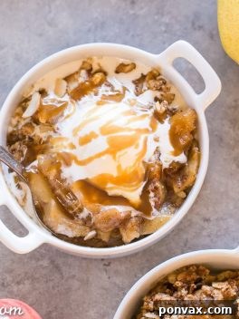 This Pear Apple Crisp combines two of the best fall fruits into one delicious crisp, flavored with vanilla, cinnamon and ginger and topped with a grain-free crumble topping. This crisp is gluten-free, Paleo, and vegan.
