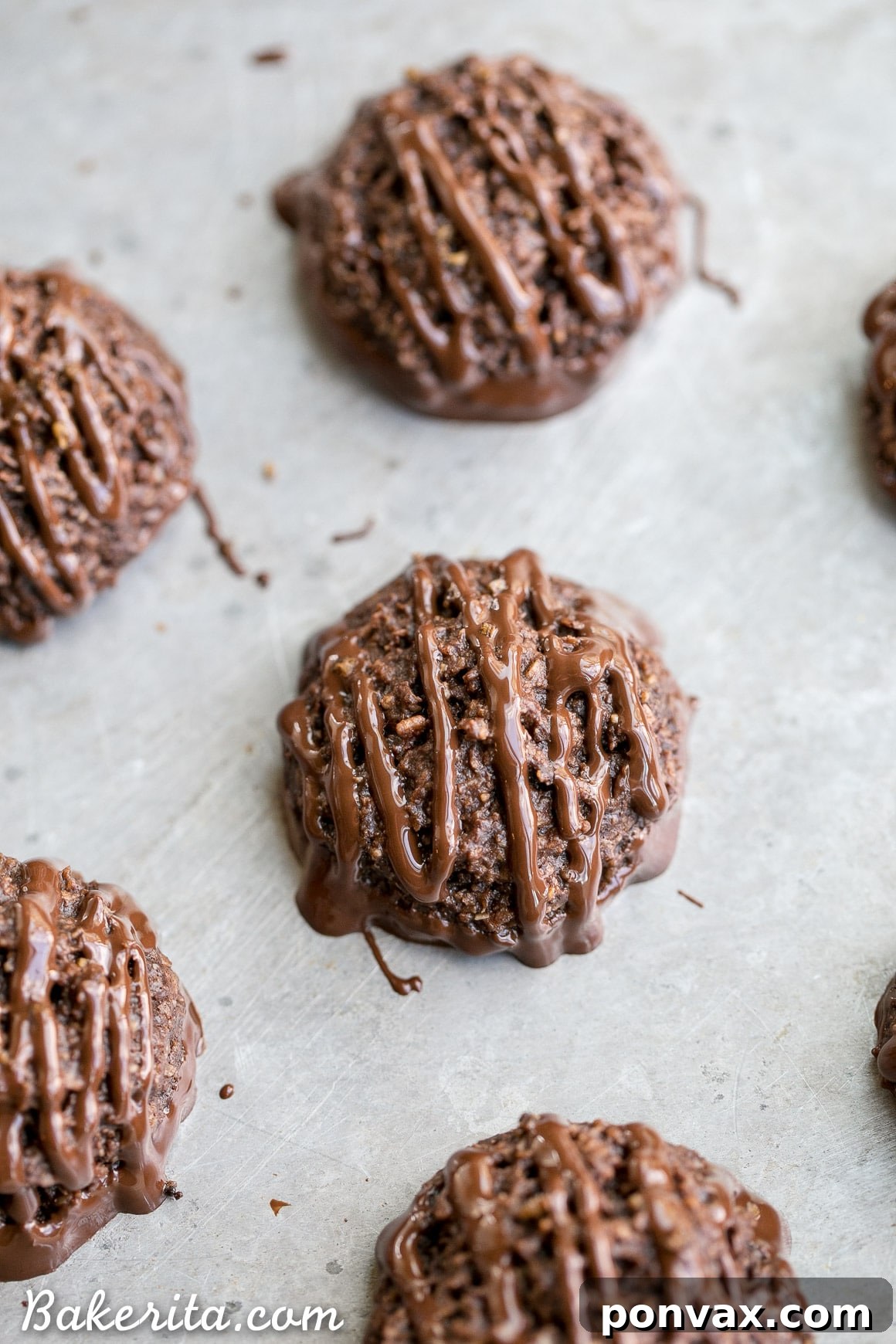 Irresistibly rich Double Chocolate Macaroons, made with cocoa powder and melted chocolate, dipped and drizzled, gluten-free, Paleo, and vegan.