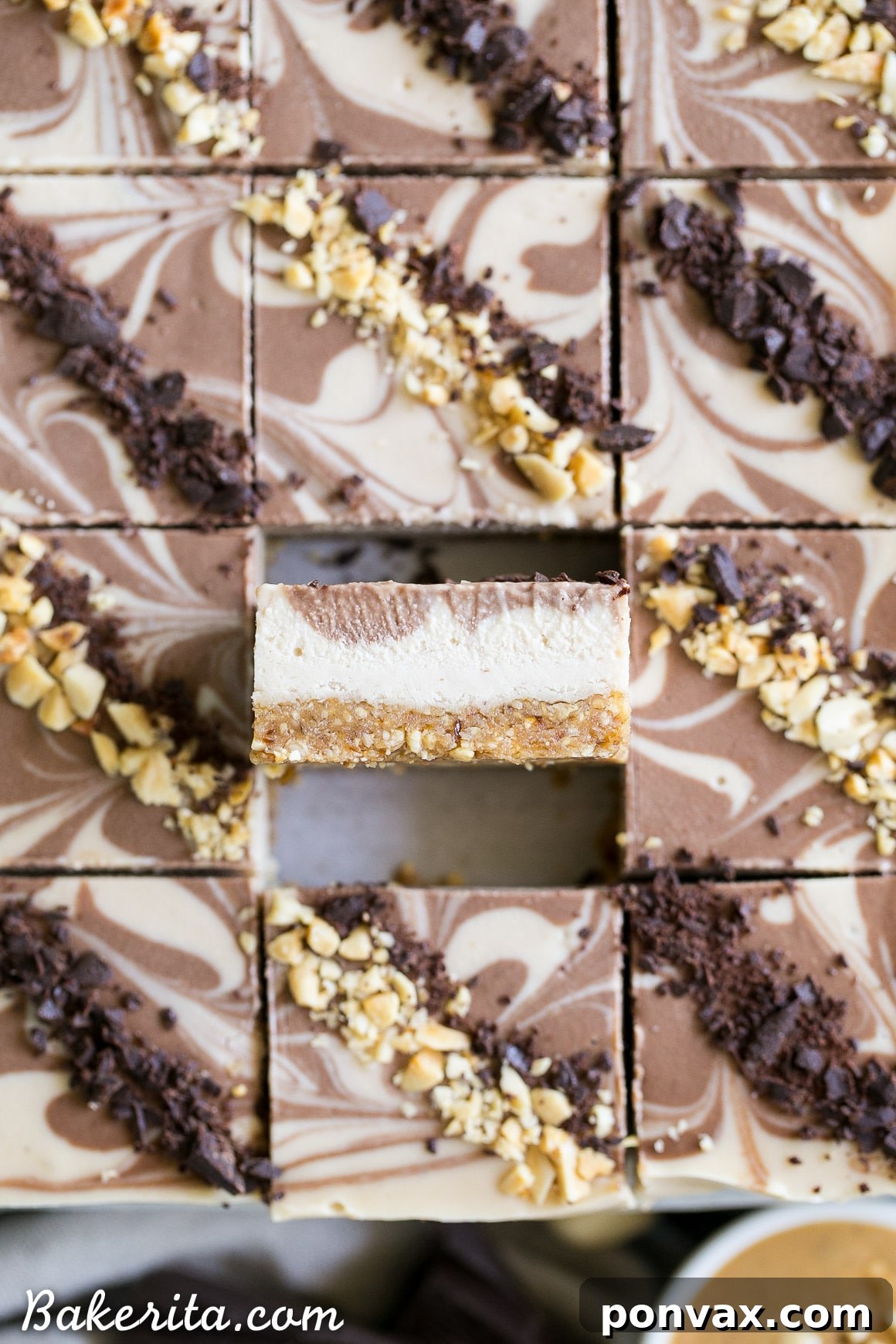 Vegan Chocolate Peanut Butter Dream Bars 4 Freshly cut No-Bake Chocolate Peanut Butter Cheesecake Bars ready to serve