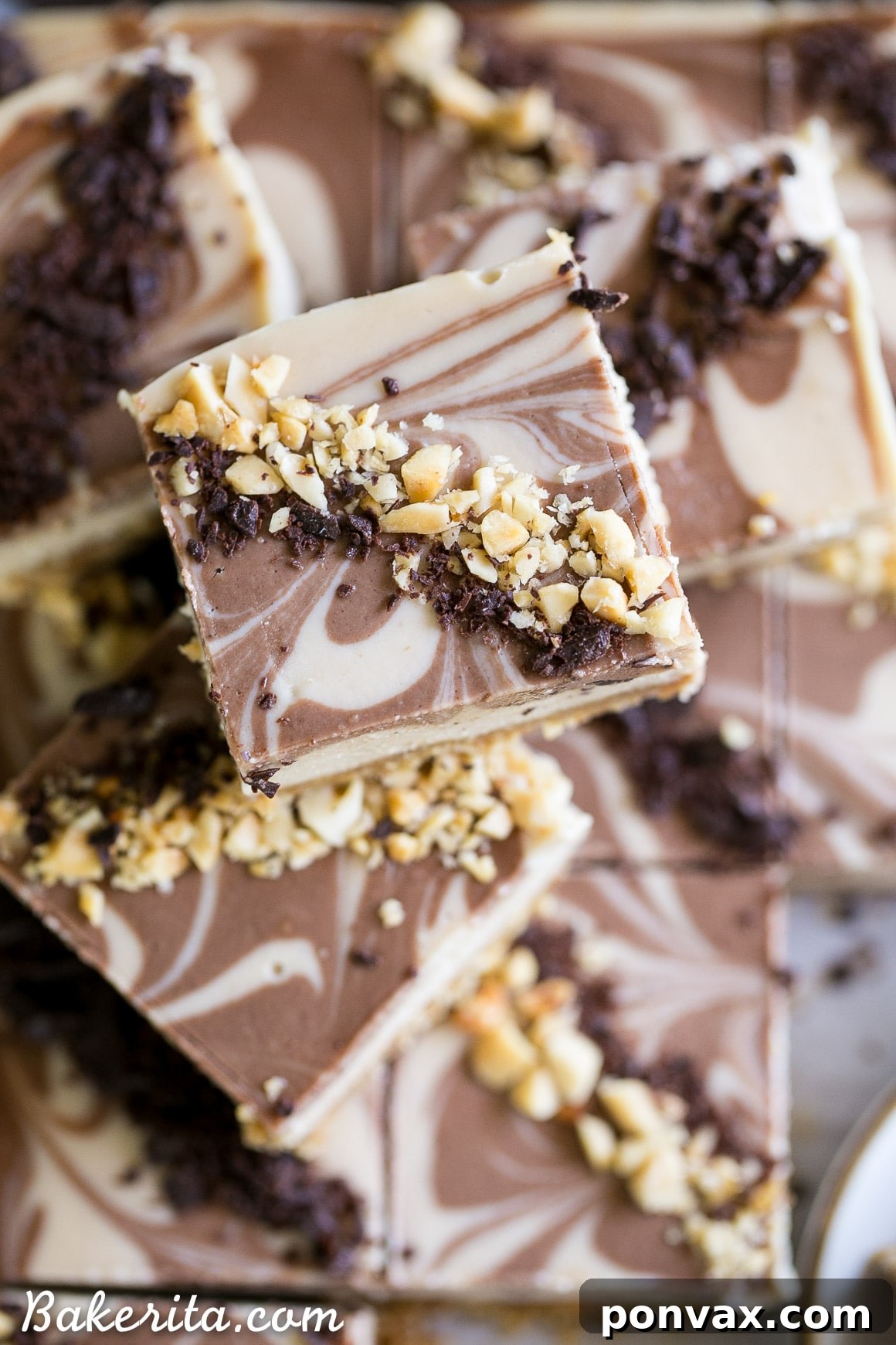 Vegan Chocolate Peanut Butter Dream Bars 6 No-Bake Chocolate Peanut Butter Cheesecake Bars garnished with chopped peanuts