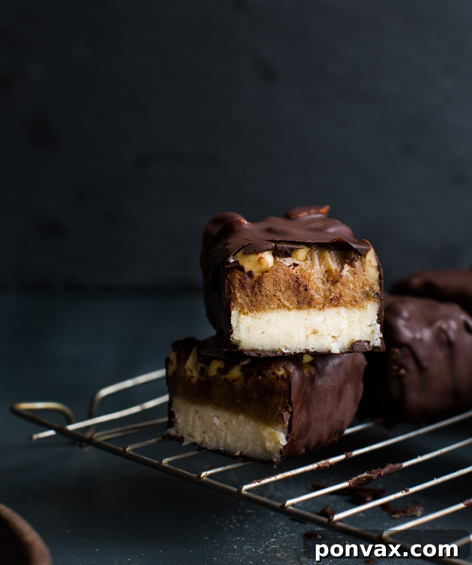 Delectable Raw Snickers Bars from 8th and Lake, a vegan recipe packed with healthy, natural ingredients and no preservatives.