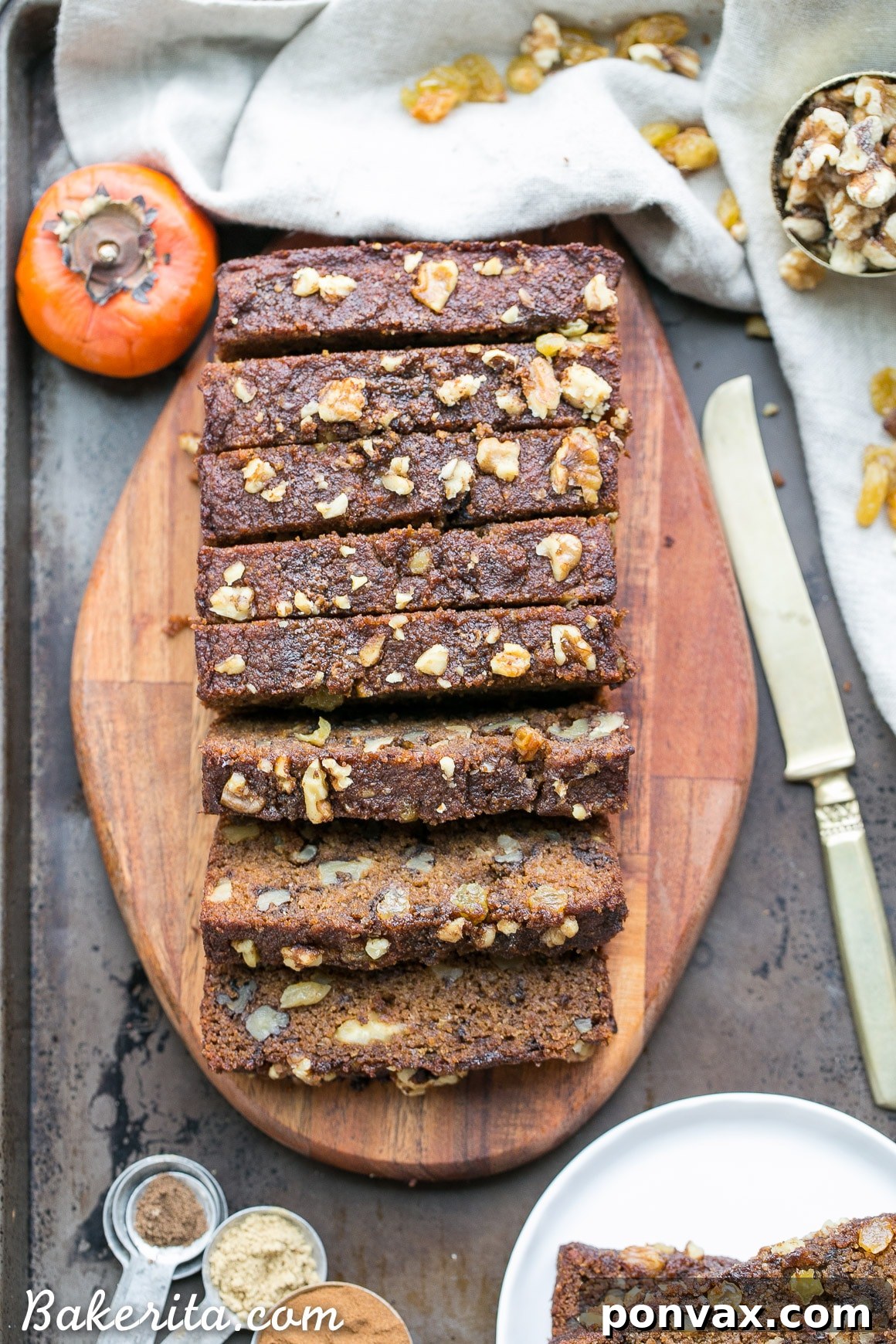 Close-up of a loaf of Paleo Persimmon Bread, showing its golden-brown crust and inviting texture.