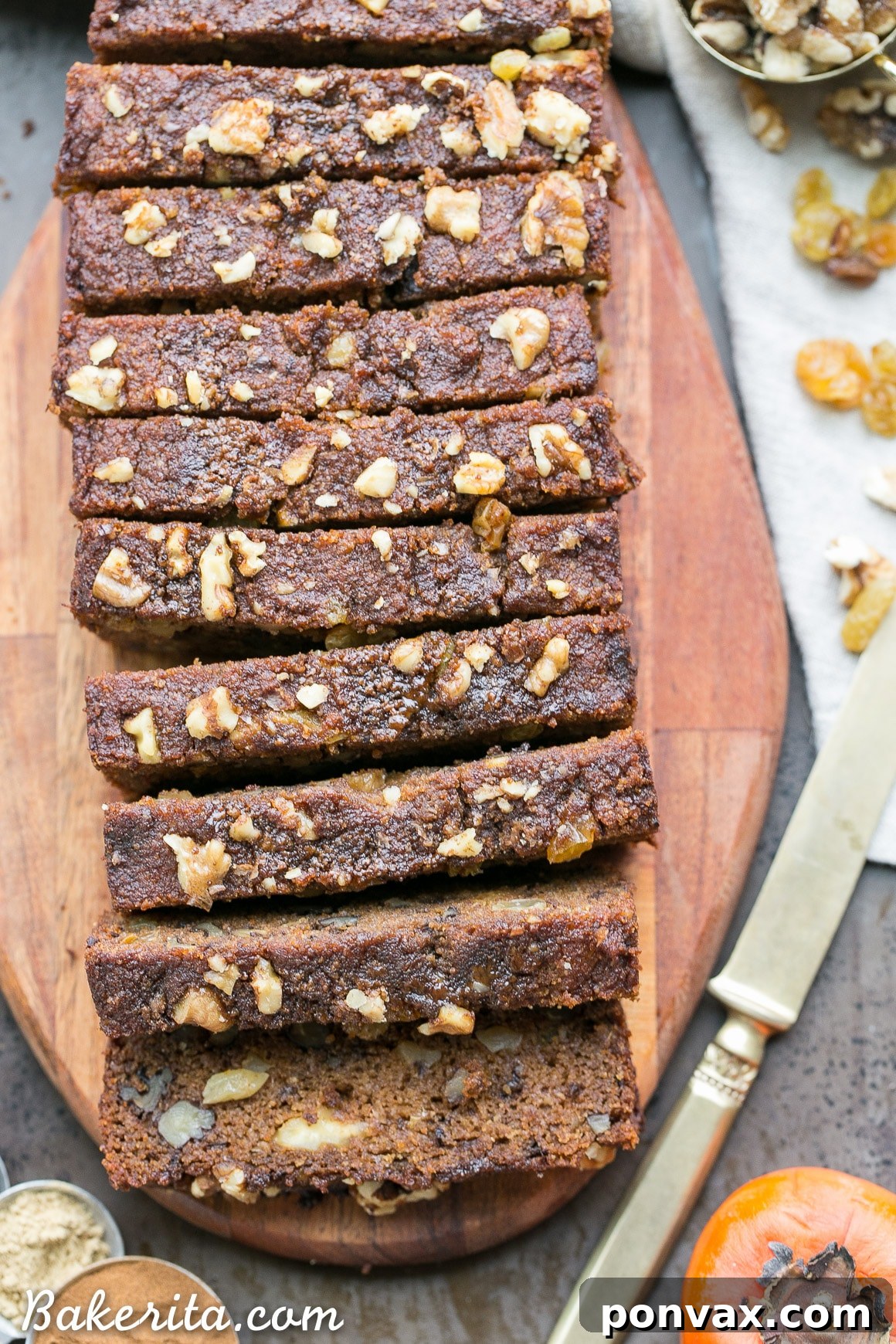 A top-down view of a whole loaf of Paleo Persimmon Bread, golden and inviting.