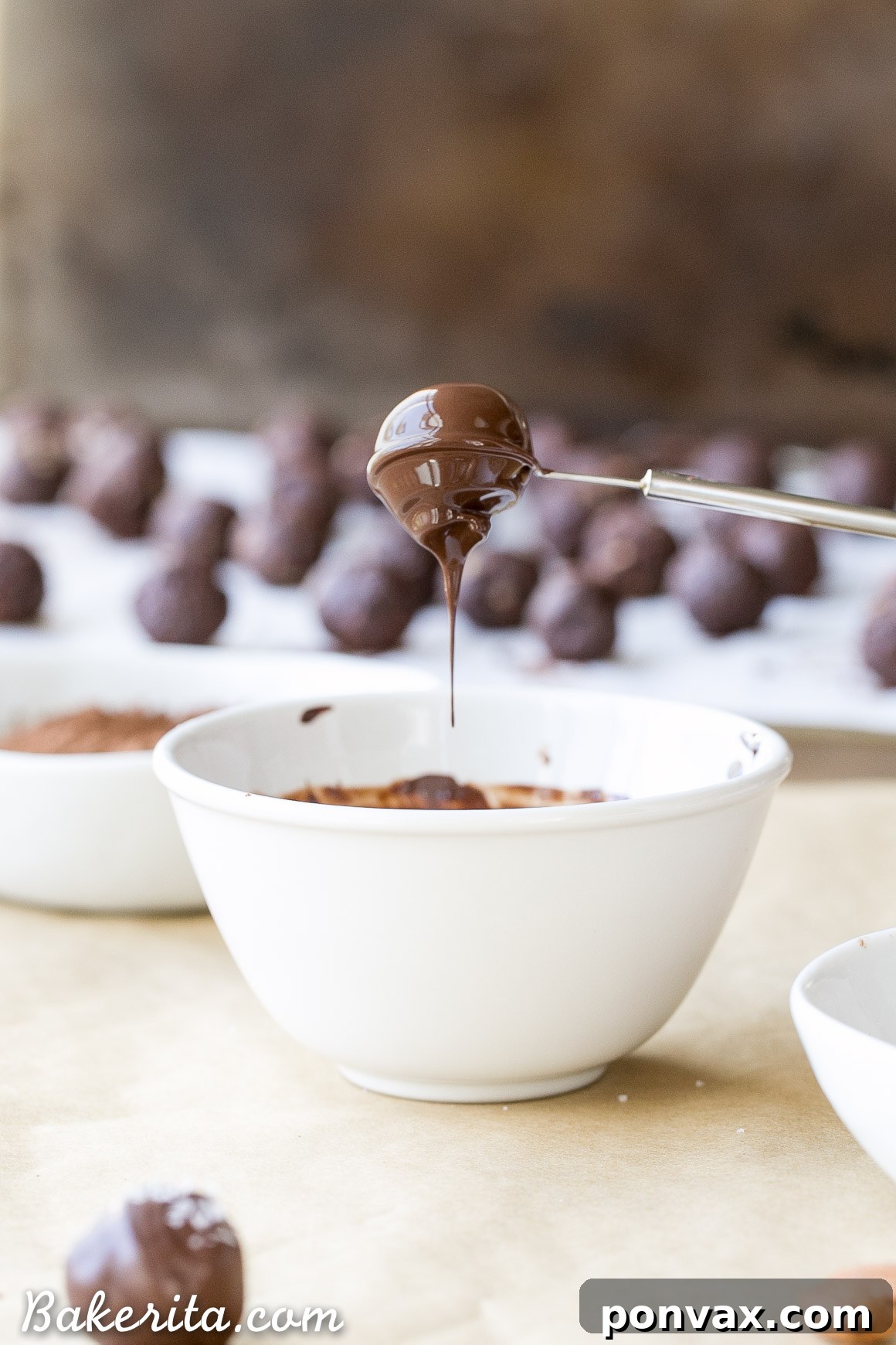 Sea Salt Almond Chocolate Delights 3 Close-up of a plate of homemade Salted Almond Chocolate Truffles, showcasing their rich texture and almond crunch.