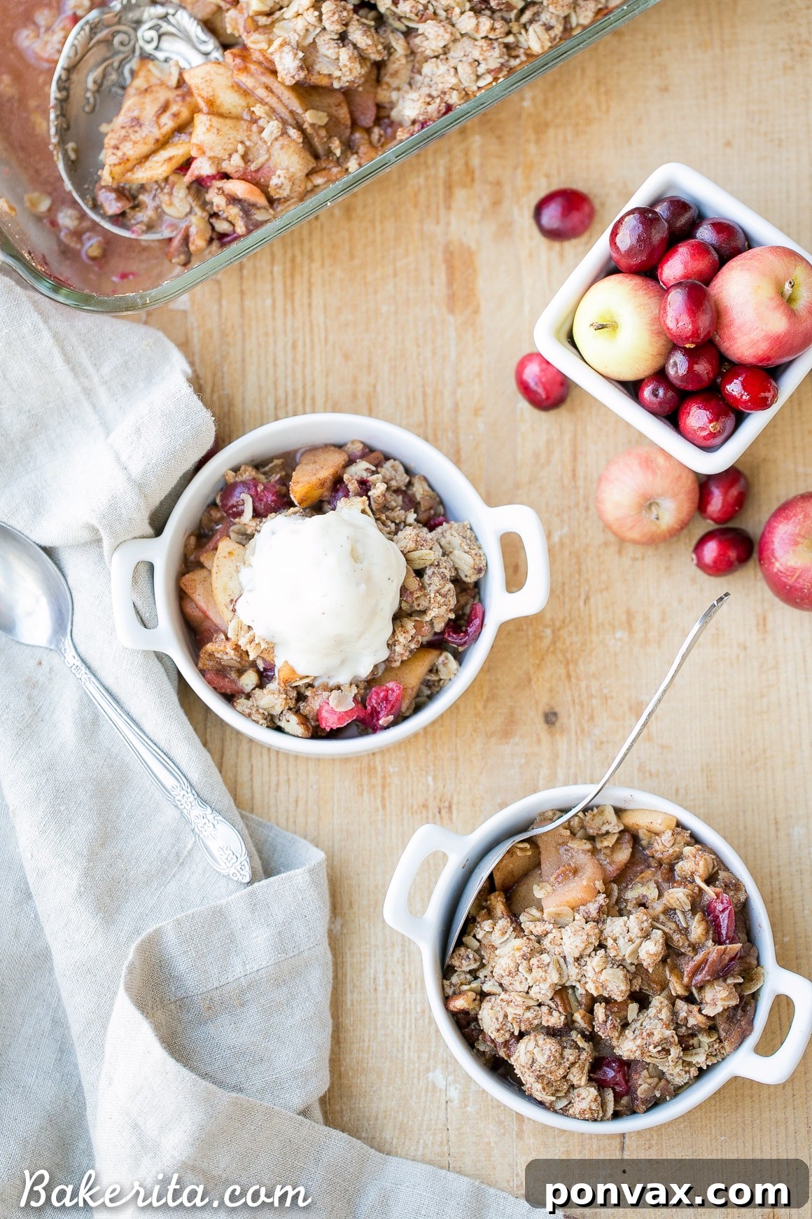 Close-up of the inviting Cranberry Apple Crisp, highlighting the tender fruit filling and the golden, crumbly pecan oatmeal topping.