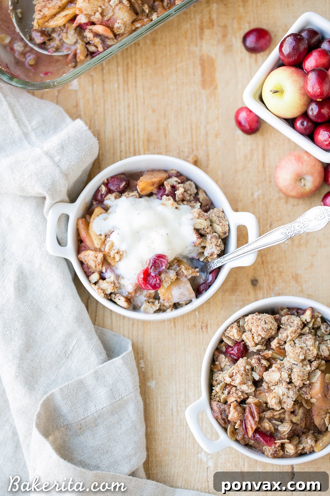 Freshly baked Cranberry Apple Crisp, golden and bubbly from the oven, ready to be served warm.