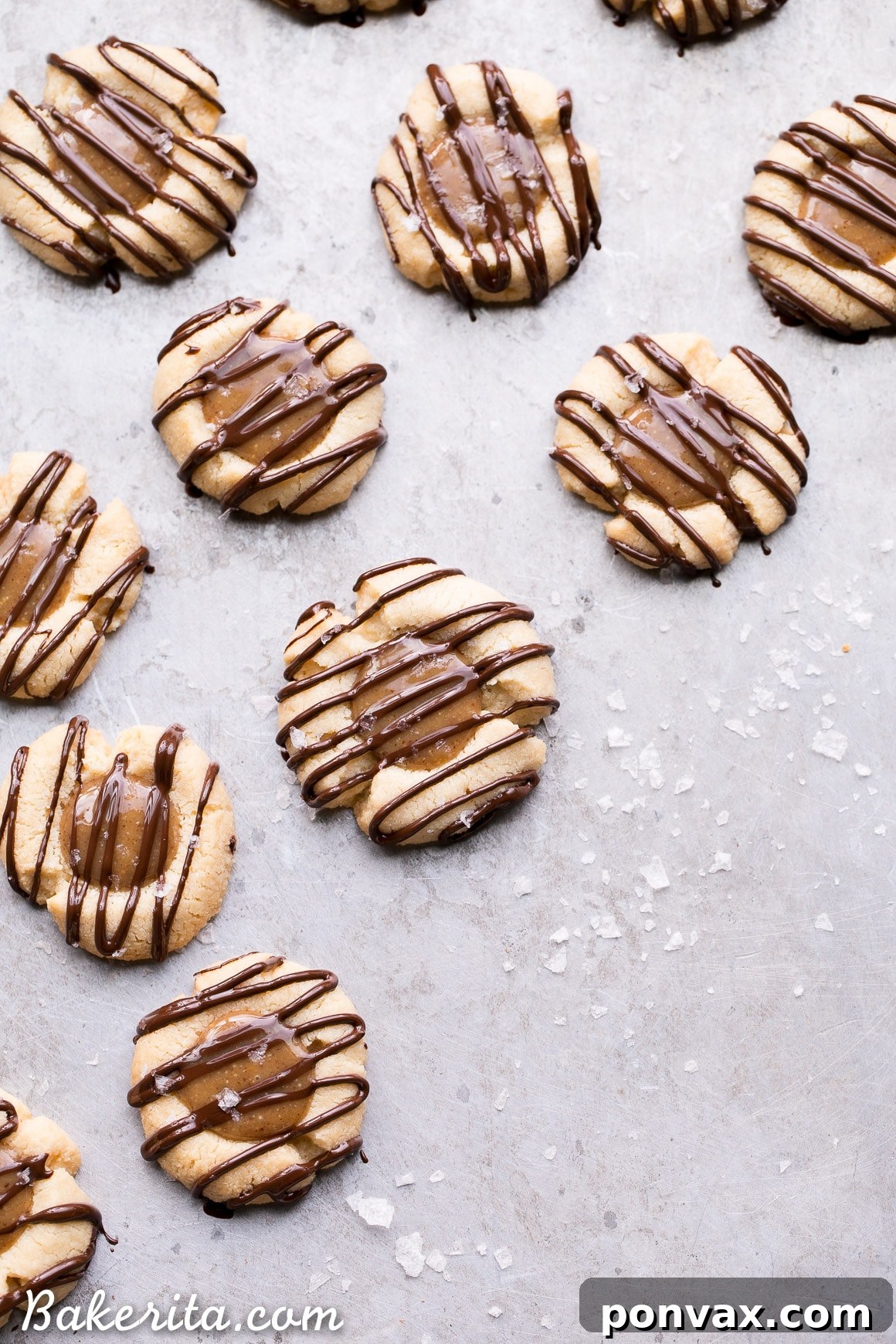 Decadent Gluten Free Salted Caramel Thumbprint Bites 2 These Salted Caramel Thumbprint Cookies are super easy to make with only 6 ingredients total! The tender gluten-free and Paleo shortbread cookies are filled with a no-cook vegan caramel and topped off with a dark chocolate drizzle and flaky sea salt. They're perfect for the holidays!