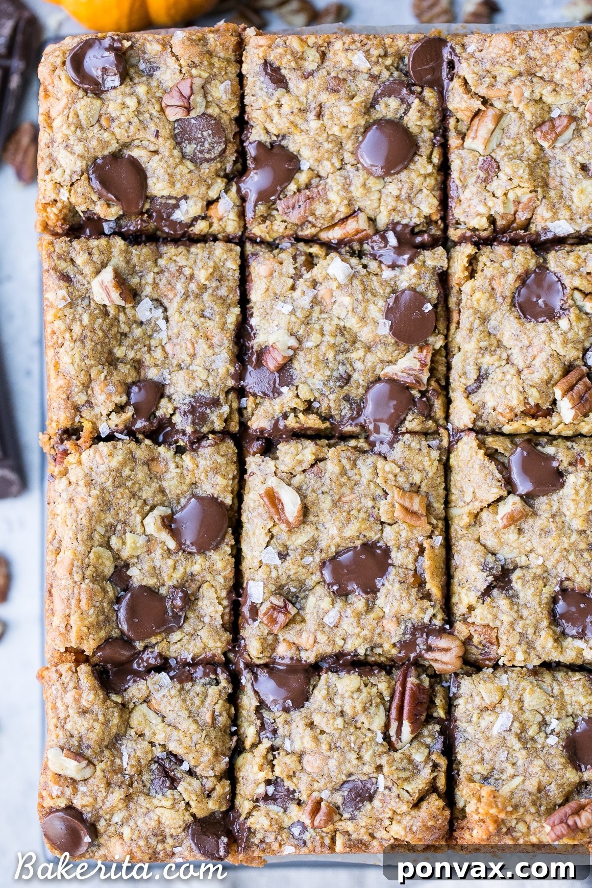 Soft, gooey, and irresistible Pumpkin Oatmeal Scotchie Bars with Chocolate Chips and Pecans, perfect for any occasion.