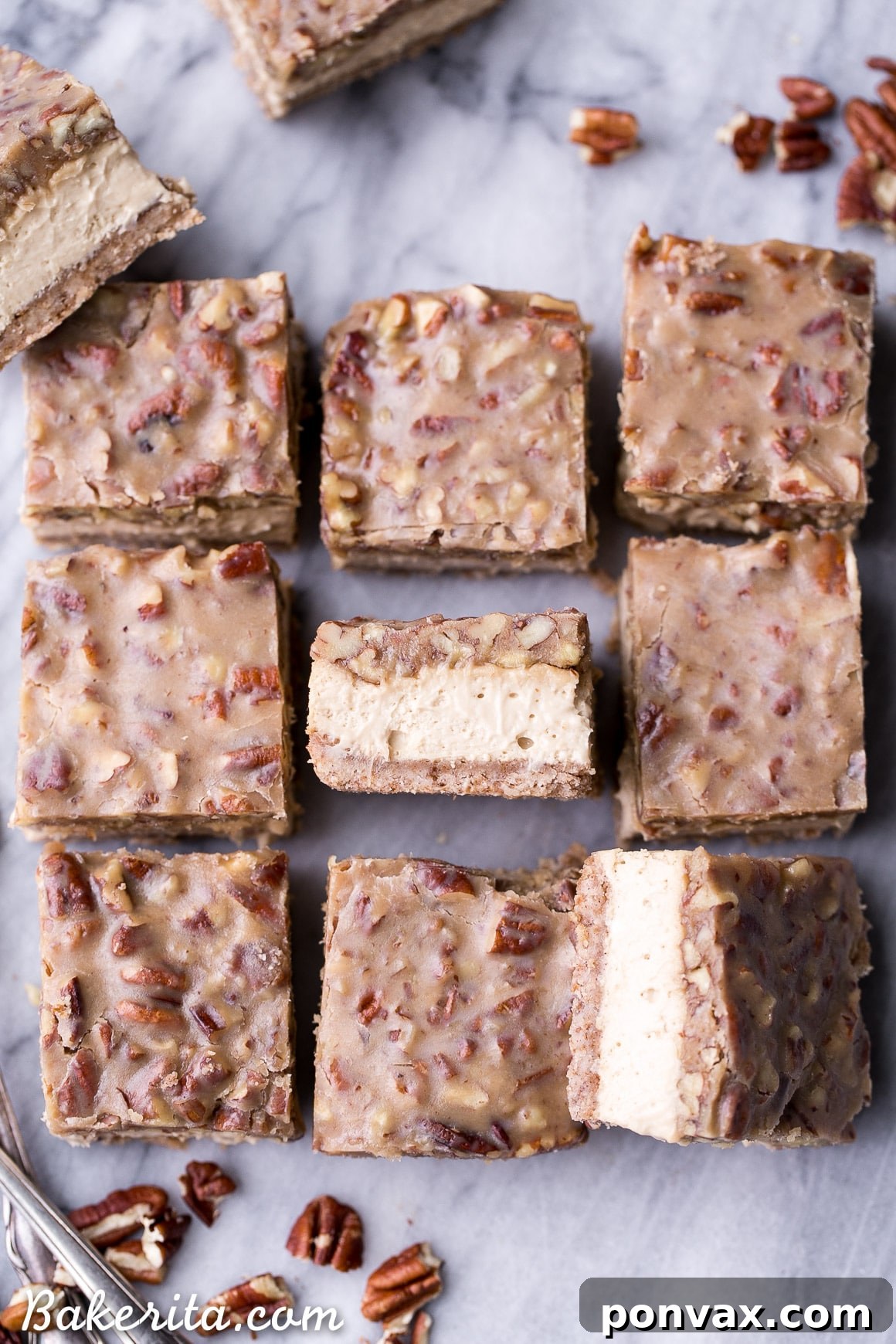 A row of baked Pecan Praline Cheesecake Bars cooling, ready for their delicious topping