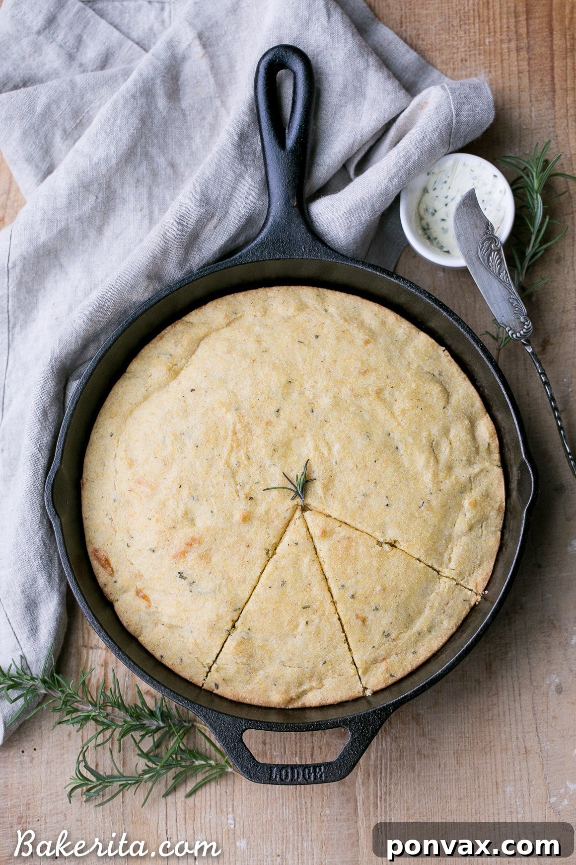 This Gluten Free Asiago Rosemary Cornbread is an easy, savory cornbread that's moist and flavorful. A slice of this gluten-free cornbread is perfect with a slather of butter or served with a bowl of soup!