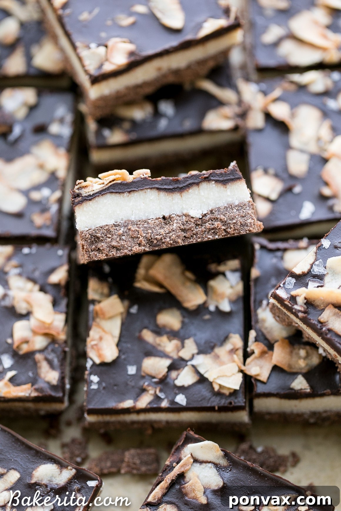A vibrant display of multiple chocolate coconut bars arranged beautifully, ready for a dessert platter.