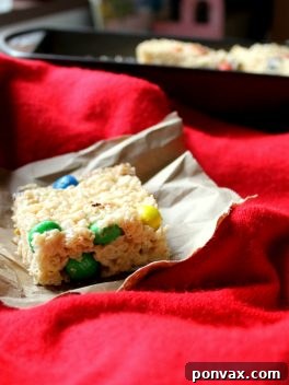 Easy Dorm Munchies Peanut Butter M&M Rice Krispies 2 Homemade Peanut Butter M&M Rice Krispie Treats displayed in a recipe card format